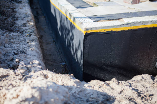 Professional Interior Drainage System technician working in Grand Rapids, MI